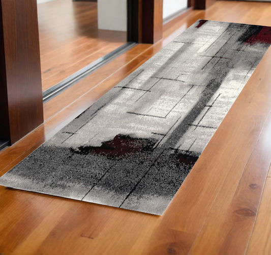 2' X 6' Gray And Burgundy Abstract Area Rug