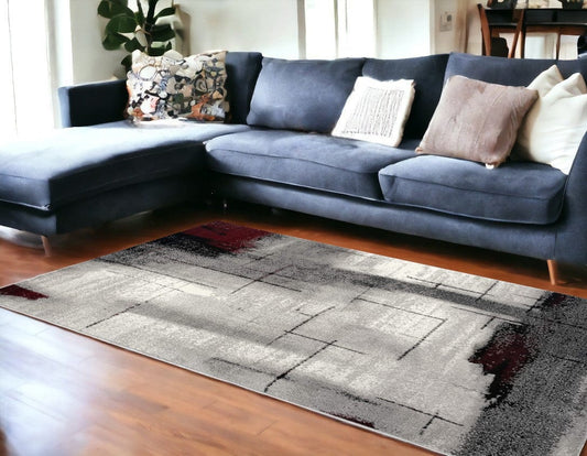 7' X 9' Gray And Burgundy Abstract Area Rug