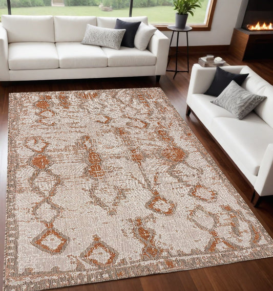 5' X 7' Beige and Brown Abstract Area Rug