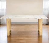 71" White And Gold Faux Marble And Steel Sled Base Dining Table - Homeroots