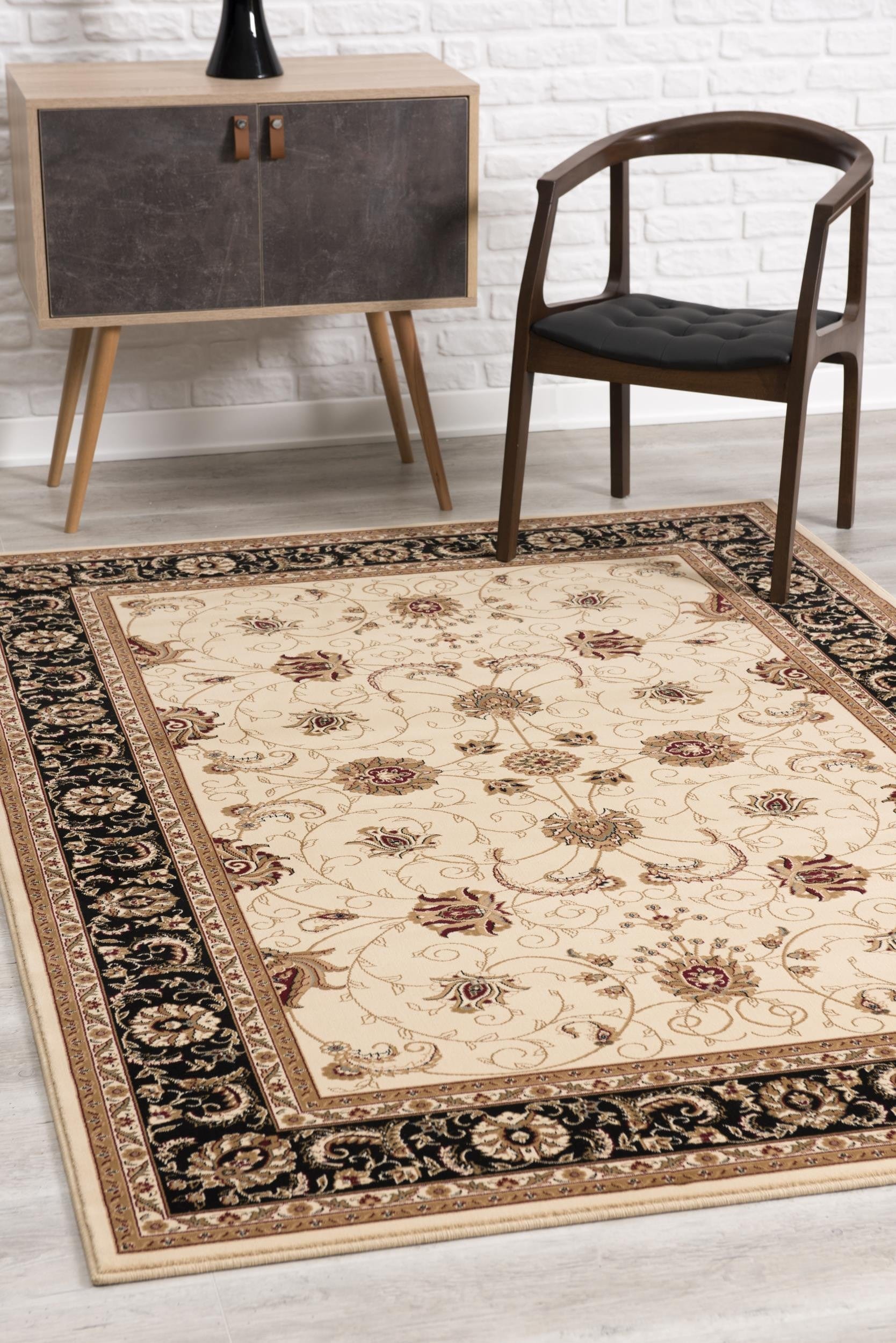 5' X 8' Black and Ivory Oriental Power Loom Area Rug - Homeroots