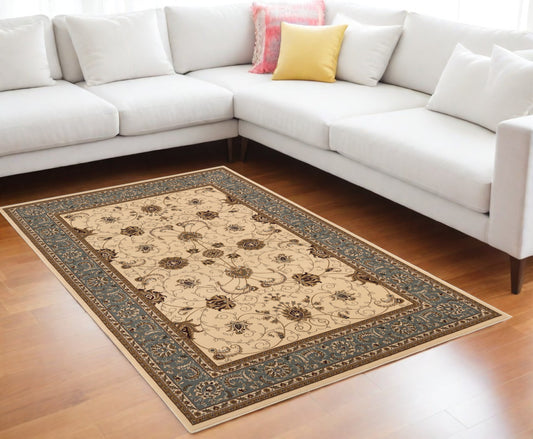 7' X 9' Blue and Ivory Oriental Power Loom Area Rug