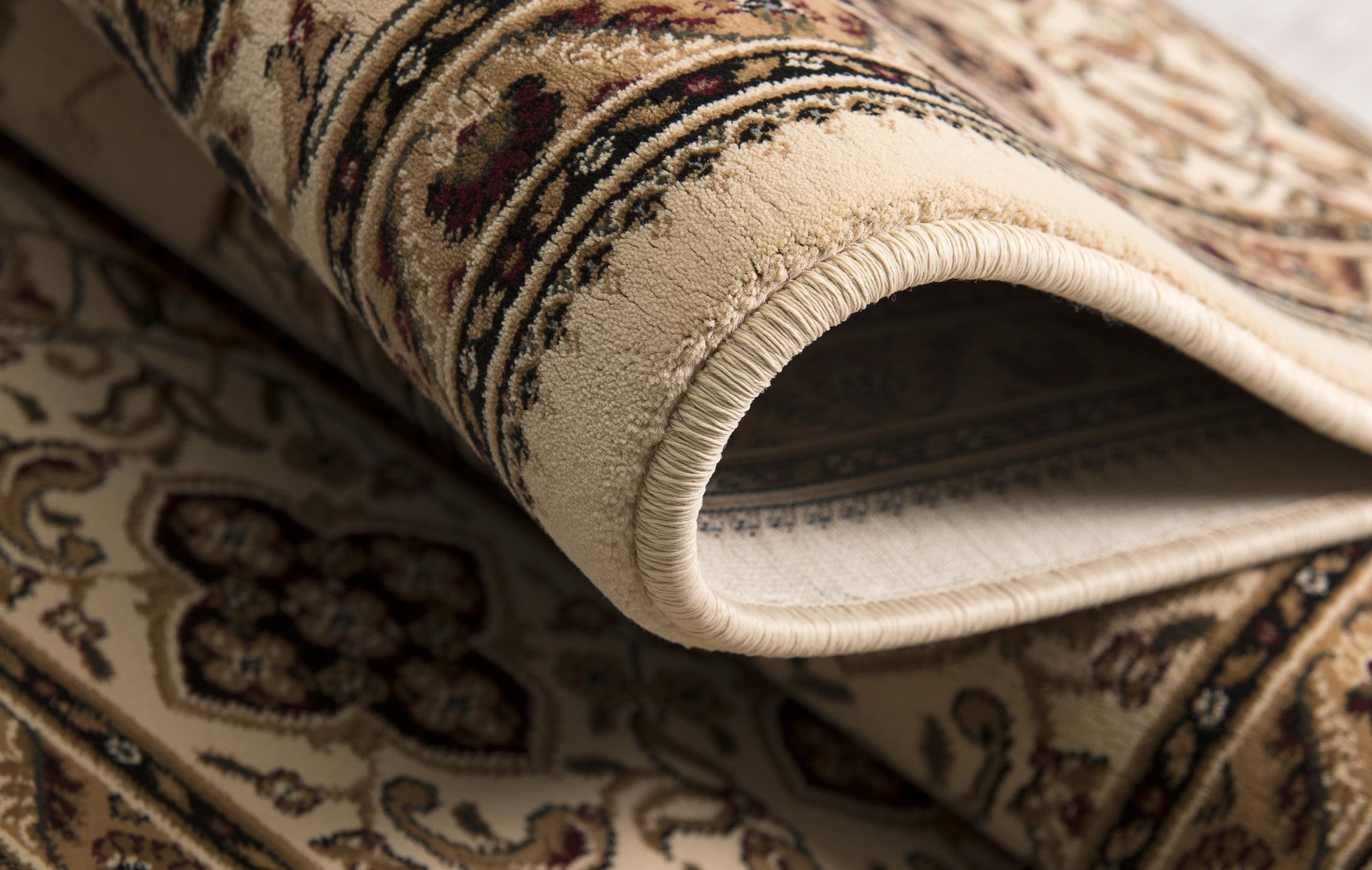 5' X 8' Beige and Black Floral Medallion Power Loom Area Rug
