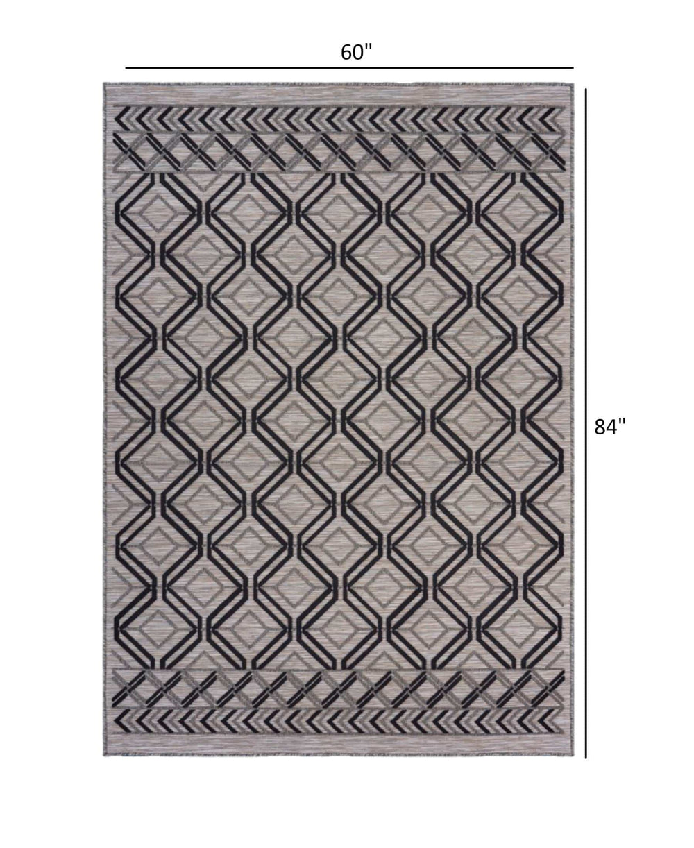 5' X 7' Black And Tan Indoor Outdoor Area Rug - Homeroots - Flyclothing LLC