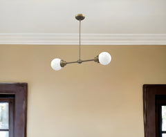 Portsmith 2-Light Raw Brass Island Pendant With White Globe Shades - Homeroots