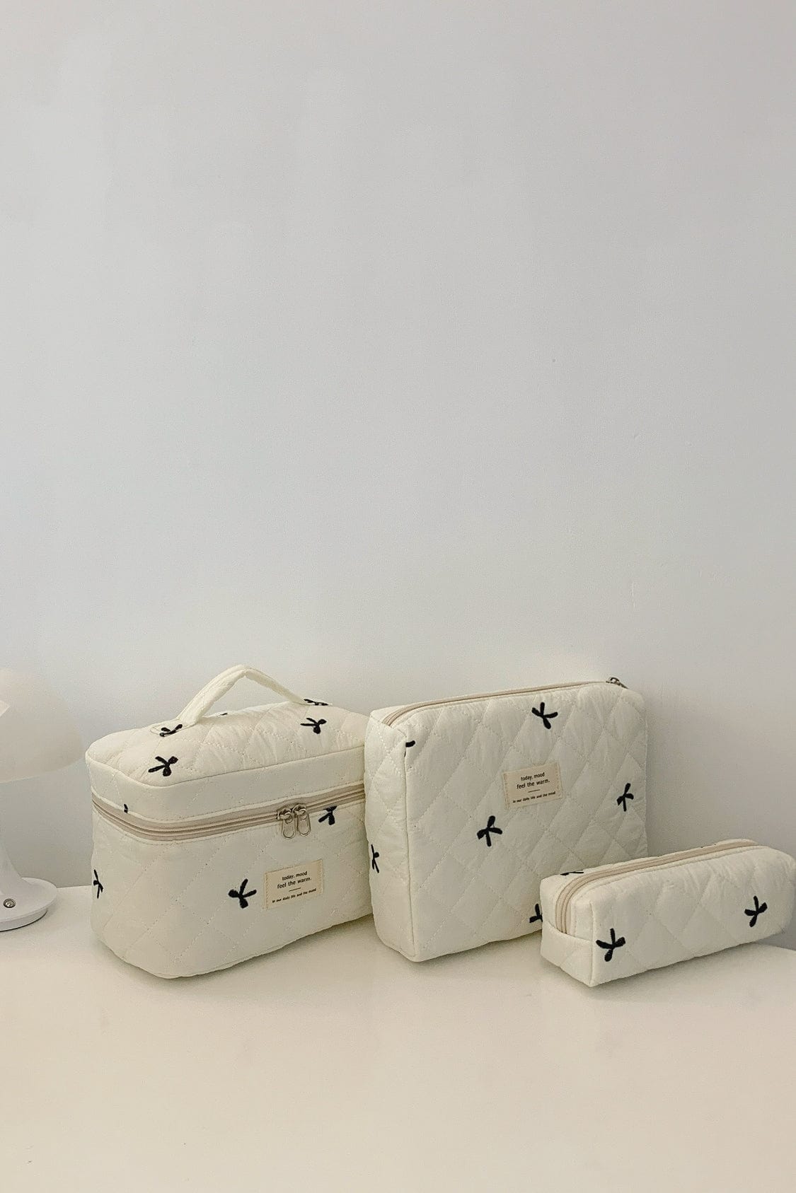 3 Piece Bow Quilted Cloth Storage Bag Set - Trendsi
