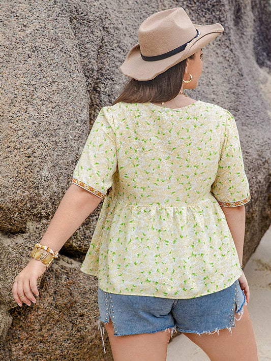 Plus Size Printed Tie Neck Half Sleeve Blouse - Trendsi - Flyclothing LLC