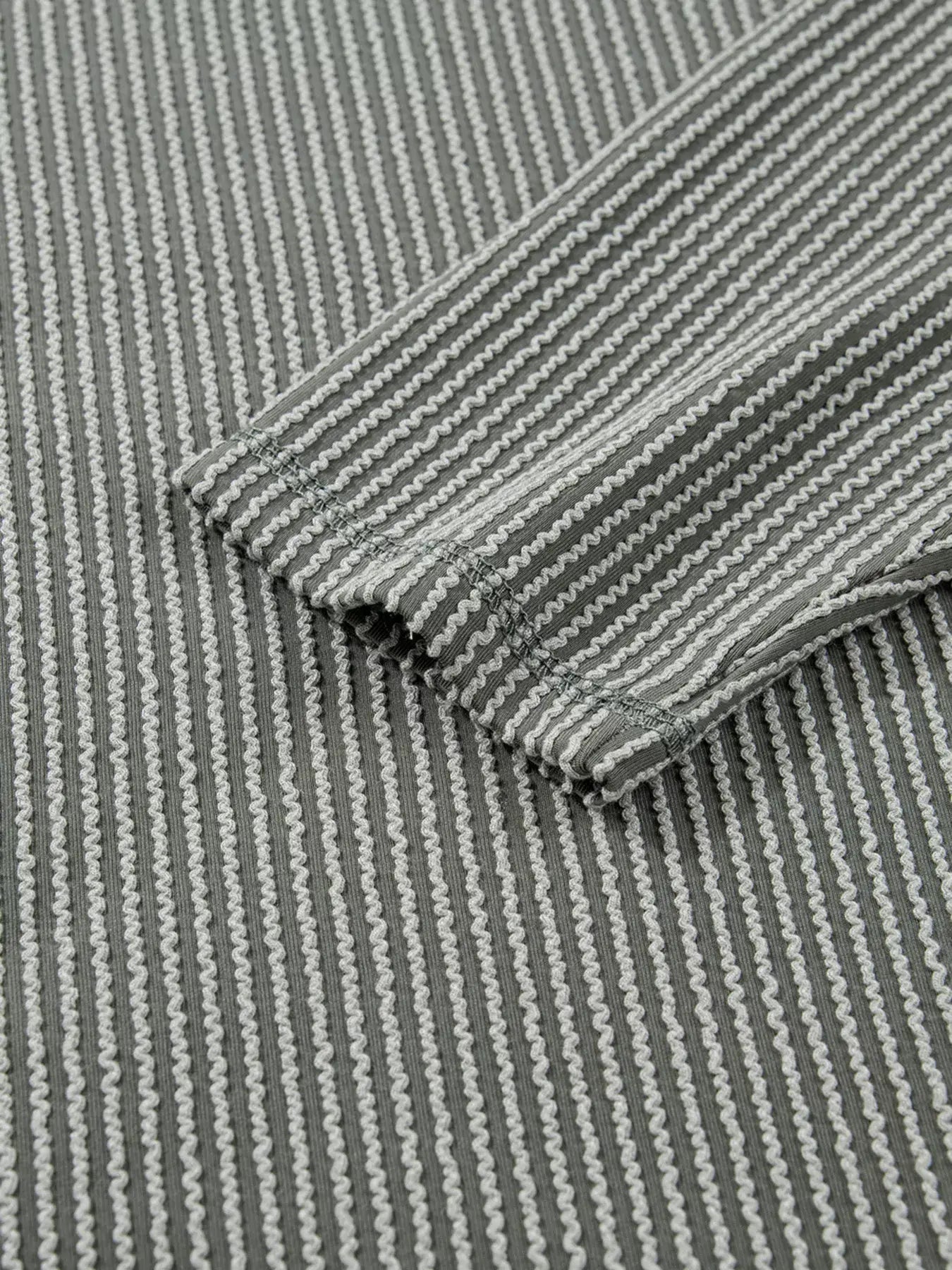 Twist Ribbed Exposed Seam Detail Long Sleeve Loose Top - Trendsi - Flyclothing LLC