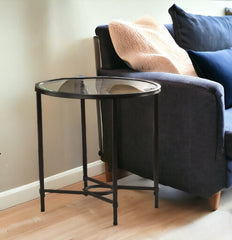 25" Black And Clear Glass Oval End Table