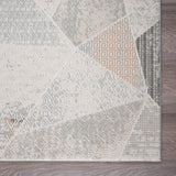 9' X 12' Gray Blue Taupe And Cream Geometric Distressed Stain Resistant Area Rug