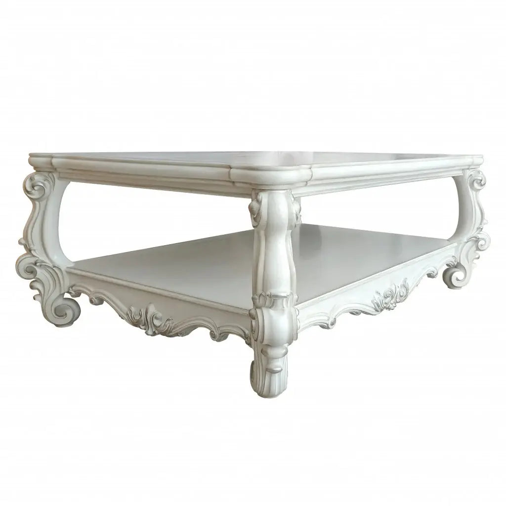 57" Antiqued White Solid And Manufactured Wood Coffee Table With Shelf - Homeroots - Flyclothing LLC