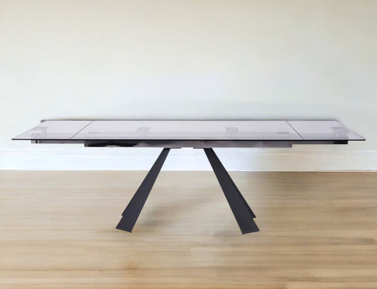 63" Clear And Black Glass And Metal Drop Leaf Pedestal Base Dining Table - Homeroots