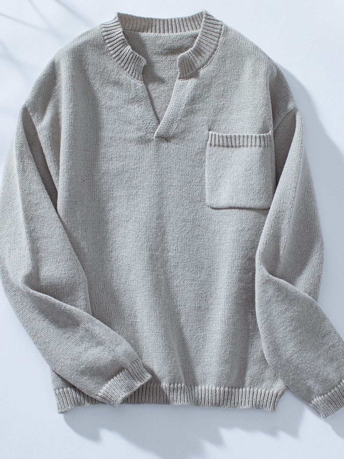 Pocketed Notched Long Sleeve Knit Top - Trendsi