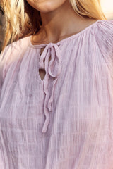 In February Textured Tie Neck Blouse - Trendsi