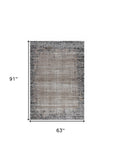 5' X 8' Brown Geometric Area Rug