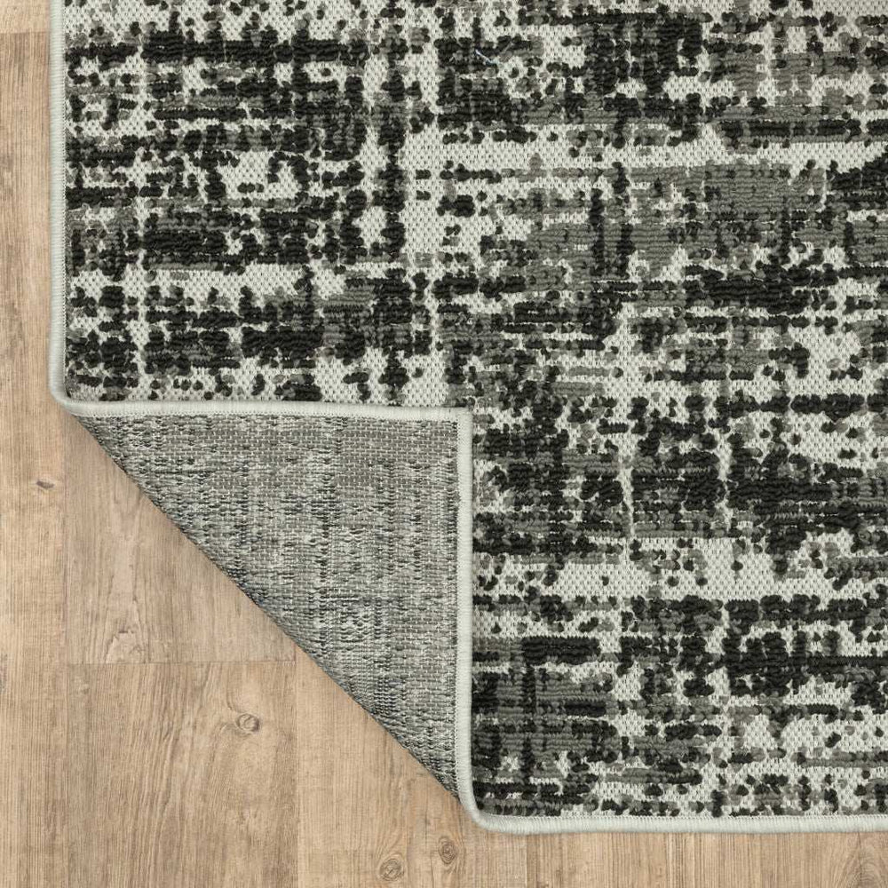 2' X 7' Beige and Black Abstract Stain Resistant Indoor Outdoor Area Rug - Homeroots - Flyclothing LLC