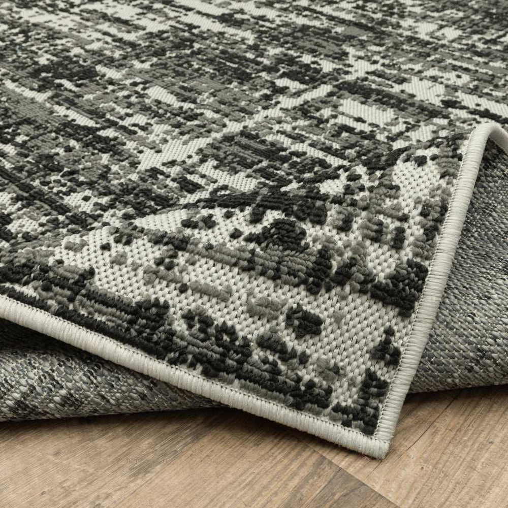 2' X 7' Beige and Black Abstract Stain Resistant Indoor Outdoor Area Rug - Homeroots - Flyclothing LLC