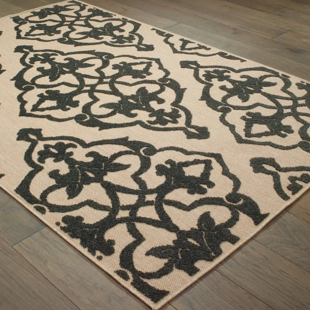 7' X 10' Beige and Black Oriental Stain Resistant Indoor Outdoor Area Rug - Homeroots - Flyclothing LLC