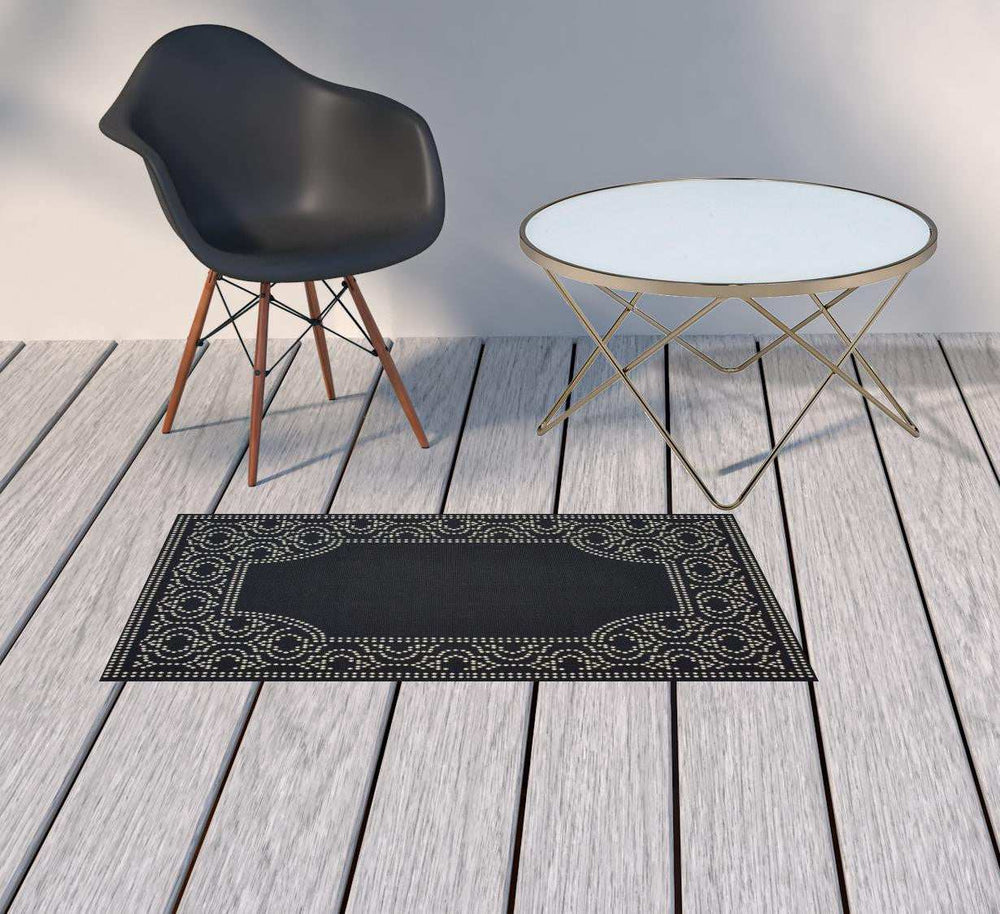 2' X 4' Black and Ivory Stain Resistant Indoor Outdoor Area Rug - Homeroots - Flyclothing LLC