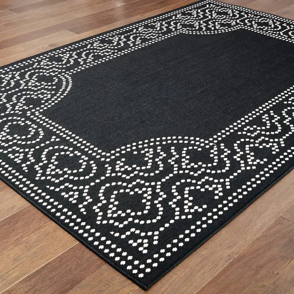 2' X 4' Black and Ivory Stain Resistant Indoor Outdoor Area Rug - Homeroots - Flyclothing LLC