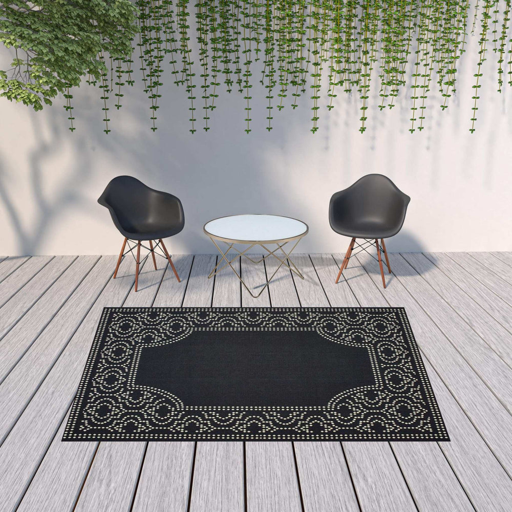 7' X 10' Black and Ivory Stain Resistant Indoor Outdoor Area Rug - Homeroots - Flyclothing LLC