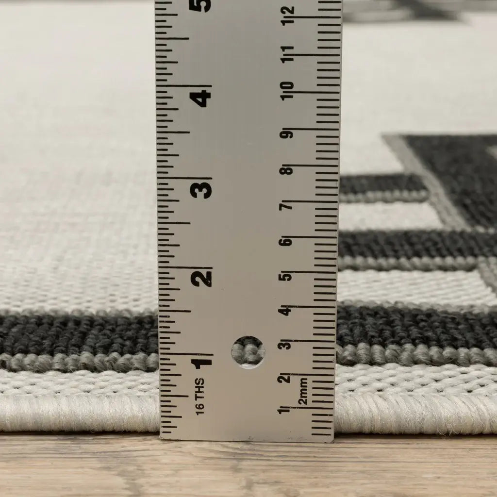 2' X 7' Beige and Black Stain Resistant Indoor Outdoor Area Rug - Homeroots - Flyclothing LLC