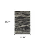 2' X 3' Charcoal Silver And Grey Abstract Shag Power Loom Stain Resistant Area Rug