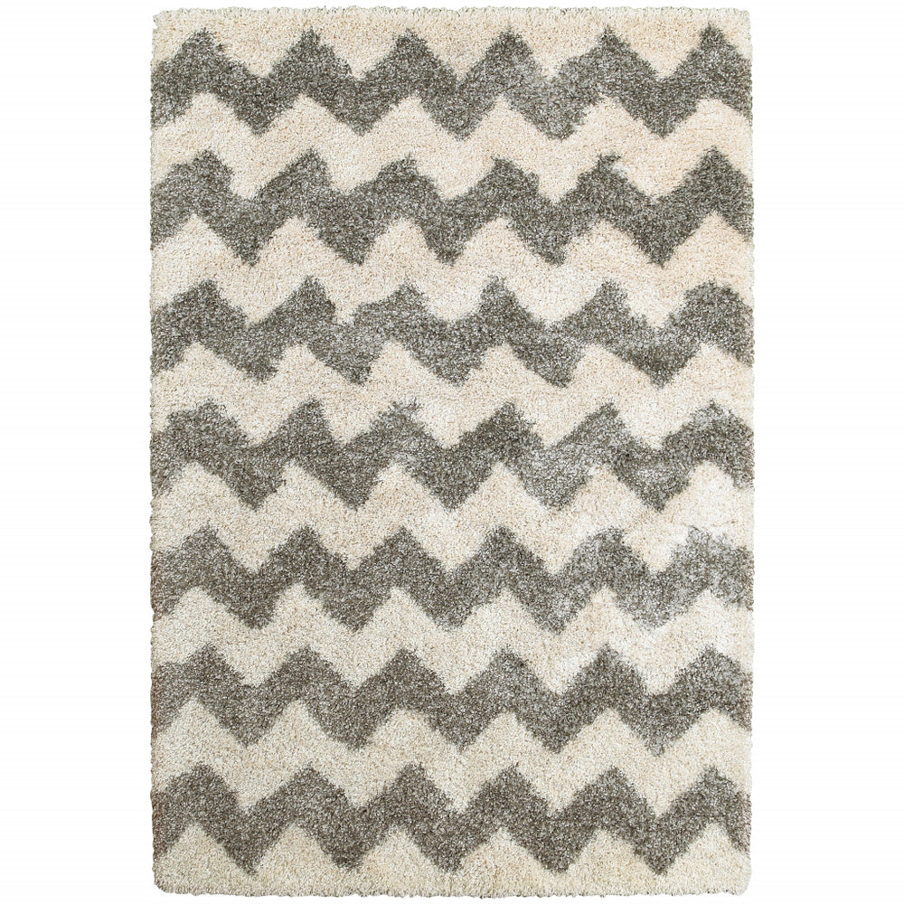 10' X 13' Grey And Ivory Geometric Shag Power Loom Stain Resistant Area Rug