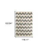 10' X 13' Grey And Ivory Geometric Shag Power Loom Stain Resistant Area Rug