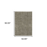 5' X 8' Brown And Beige Geometric Distressed Area Rug