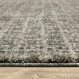 5' X 8' Brown And Beige Geometric Distressed Area Rug