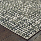 10' X 13' Grey And Ivory Abstract Power Loom Stain Resistant Area Rug