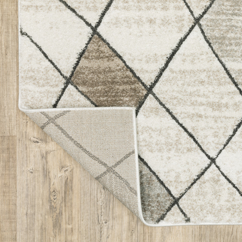 6' X 9' Beige Grey Tan And Brown Geometric Power Loom Stain Resistant Area Rug - Homeroots