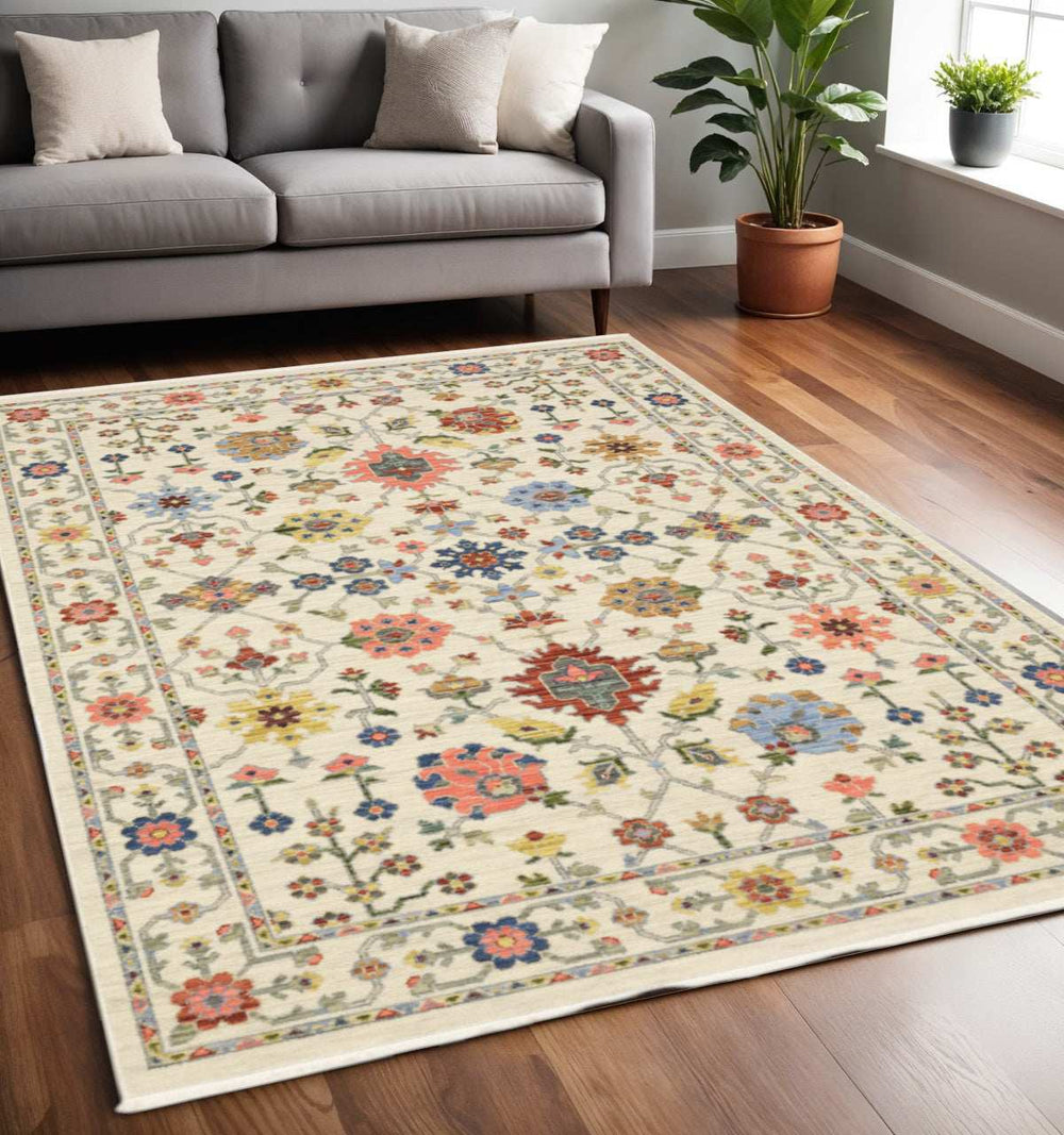 5' X 8' Ivory Salmon Pink Gold Blues Grey Rust And Green Oriental Power Loom Stain Resistant Area Rug With Fringe - Homeroots - Flyclothing LLC