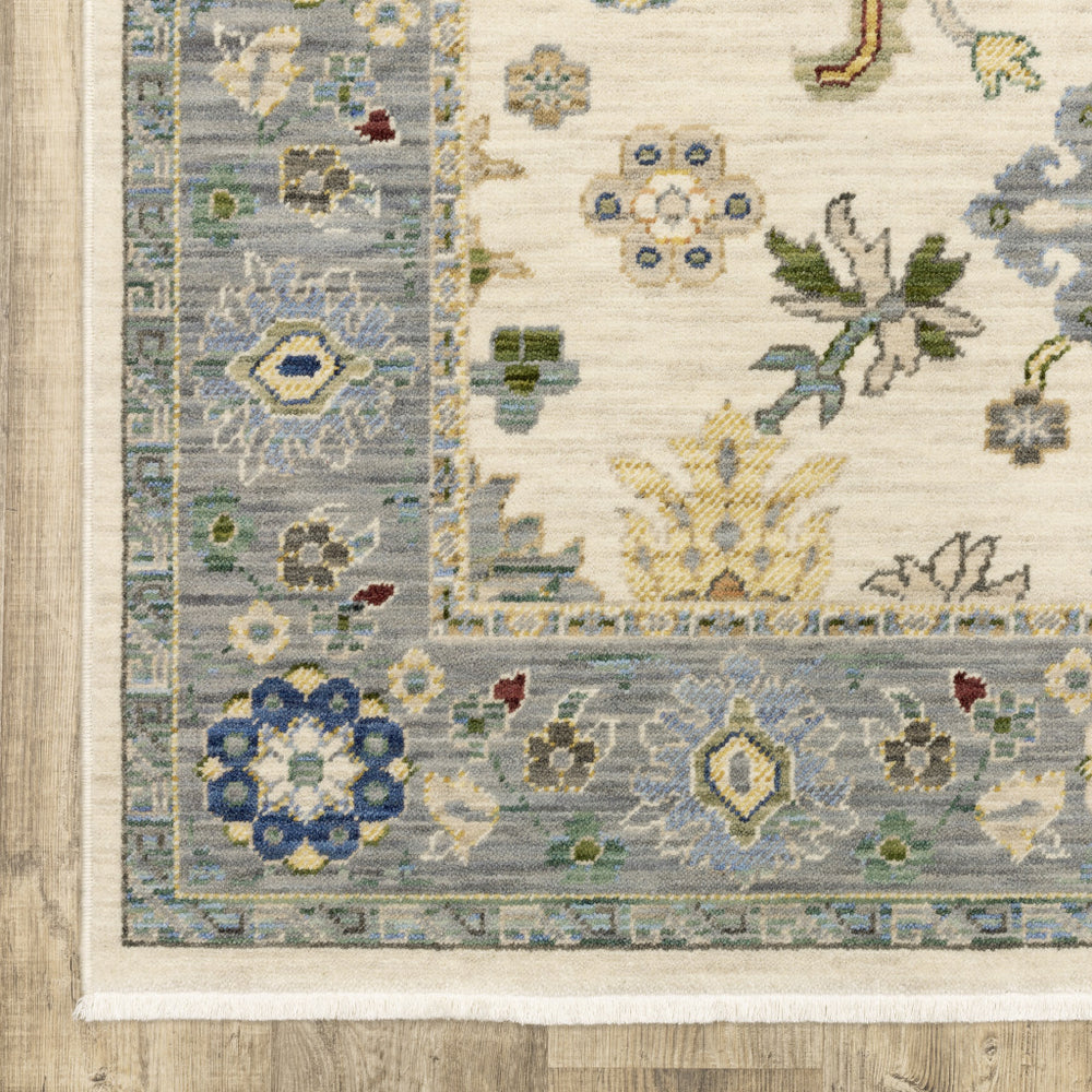 2' X 6' Ivory Blue Grey Teal Gold Green And Rust Oriental Power Loom Stain Resistant Runner Rug With Fringe