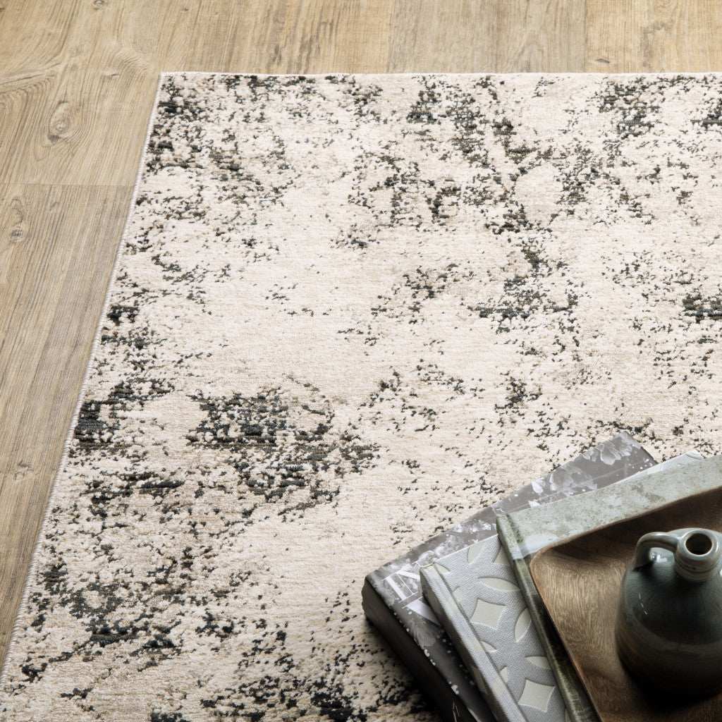 10' X 13' Ivory Grey Black Beige And Tan Abstract Power Loom Stain Resistant Area Rug - Homeroots - Flyclothing LLC