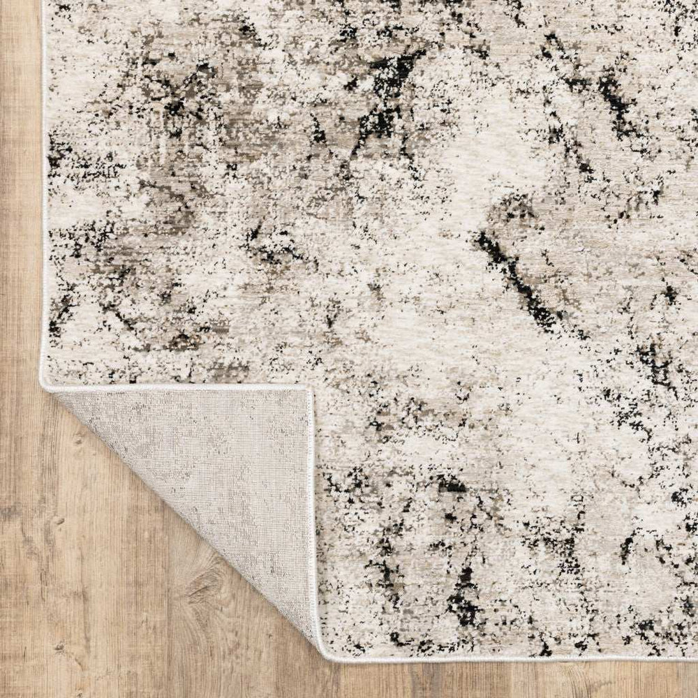 10' X 13' Ivory Grey Black Beige And Tan Abstract Power Loom Stain Resistant Area Rug - Homeroots - Flyclothing LLC