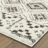 10' X 13' Ivory And Brown Geometric Shag Power Loom Stain Resistant Area Rug
