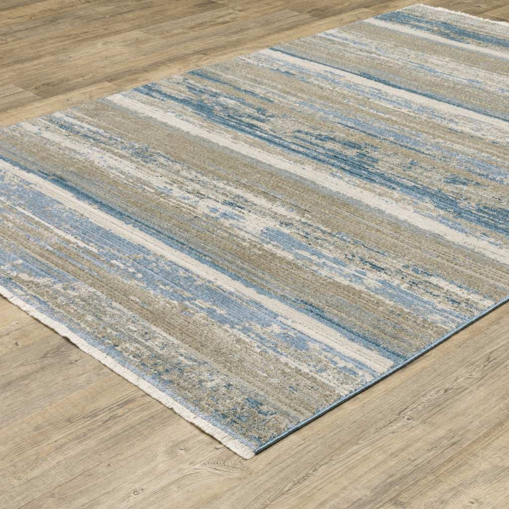 10' X 13' Ivory Beige Grey Blue And Tan Abstract Power Loom Stain Resistant Area Rug With Fringe - Homeroots - Flyclothing LLC