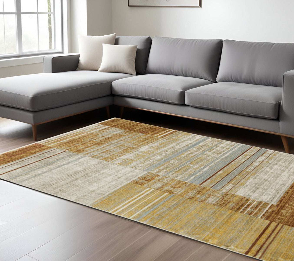 6' X 9' Rust Gold Blue Grey Ivory And Tan Geometric Power Loom Stain Resistant Area Rug With Fringe - Homeroots - Flyclothing LLC