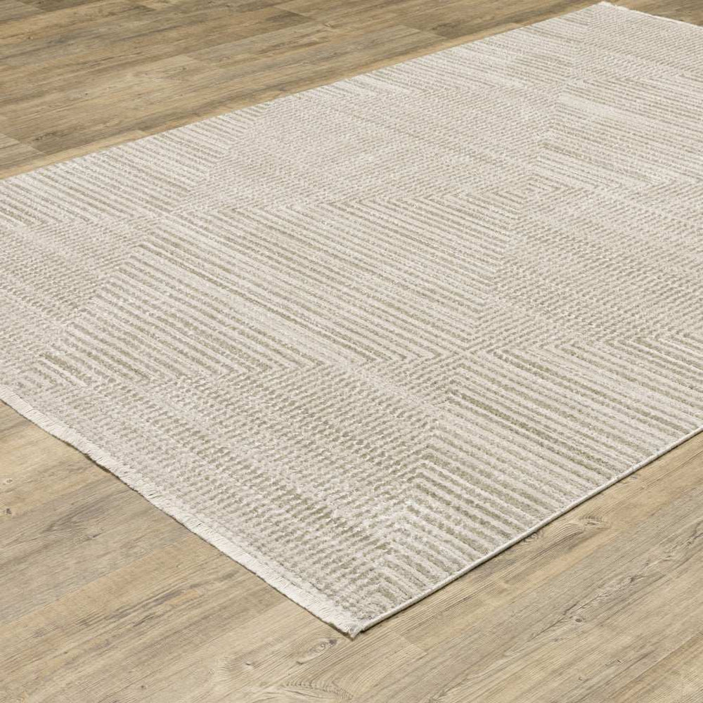 10' X 13' Ivory Beige Taupe And Tan Geometric Power Loom Stain Resistant Area Rug With Fringe - Homeroots - Flyclothing LLC
