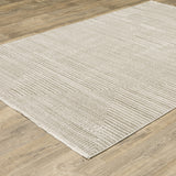 10' X 13' Ivory Beige Taupe And Tan Geometric Power Loom Stain Resistant Area Rug With Fringe - Homeroots