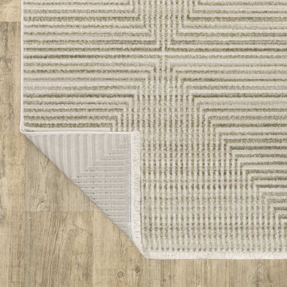 10' X 13' Ivory Beige Taupe And Tan Geometric Power Loom Stain Resistant Area Rug With Fringe - Homeroots - Flyclothing LLC