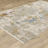 10' X 13' Beige Grey Gold Blue Rust And Teal Abstract Power Loom Stain Resistant Area Rug With Fringe - Homeroots