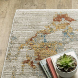 10' X 13' Beige Grey Gold Blue Rust And Teal Abstract Power Loom Stain Resistant Area Rug With Fringe - Homeroots - Flyclothing LLC