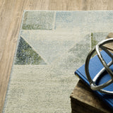 2' X 8' Blue Green Grey Gold And Ivory Geometric Power Loom Stain Resistant Runner Rug