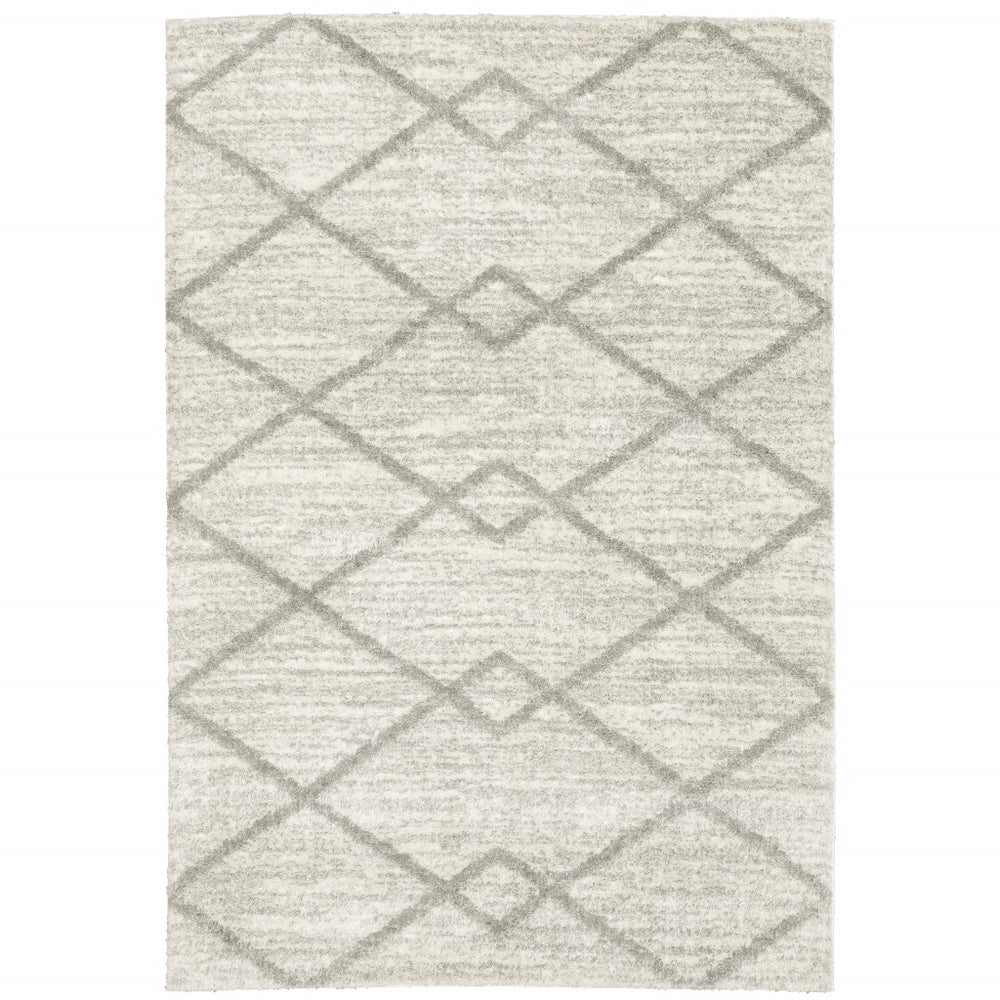 10' X 13' Ivory And Grey Geometric Shag Power Loom Stain Resistant Area Rug