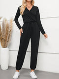 Surplice Tie Waist Long Sleeve Jumpsuit - Trendsi