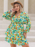 Plus Size Printed Surplice Long Sleeve Mini Dress - Trendsi