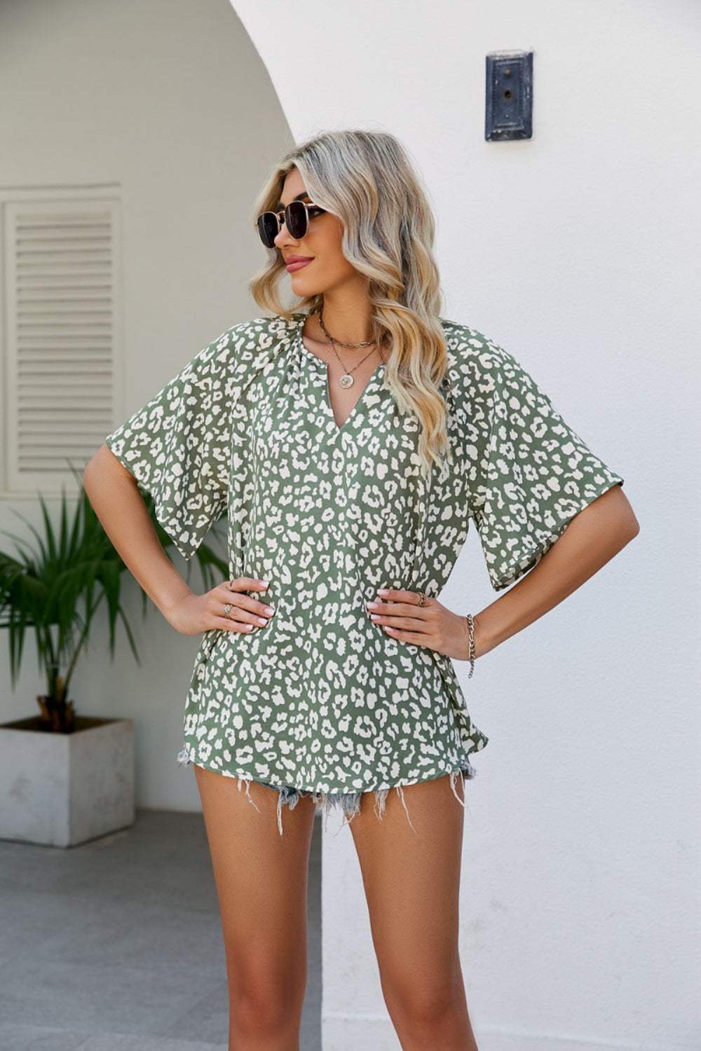 Leopard Notched Half Sleeve Blouse - Trendsi - Flyclothing LLC